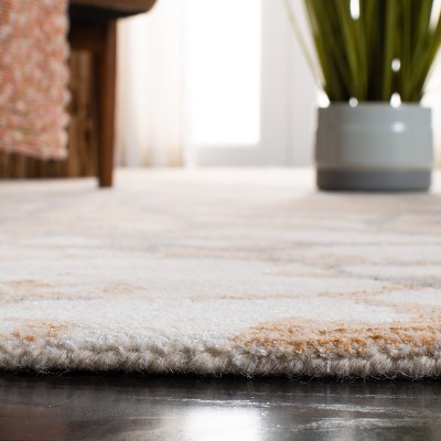 Ivory and Gold Hand-Tufted Wool Area Rug, 3' x 5'