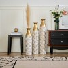 AENKYO Set of 3 Metal Tall Floor Vases, Gold Geometric Cylinder Vases with Vine Patterns -  for Living Room & Home Decor - 25"/29"/34" Height - 2 of 4