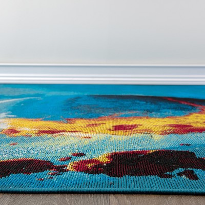 Galactic Wonder Blue and Red Synthetic Area Rug 5' x 7'