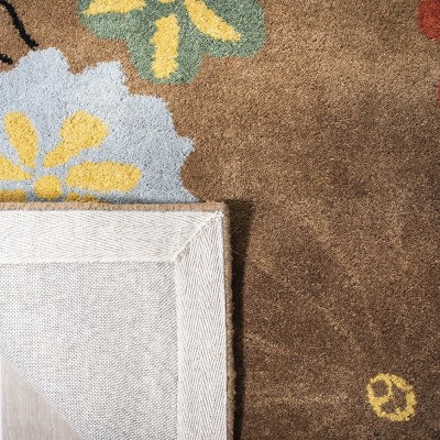 Handmade Brown and Multicolor Floral Wool Area Rug