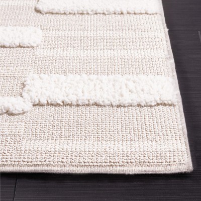Ivory Geometric 9' x 12' Synthetic Easy Care Area Rug