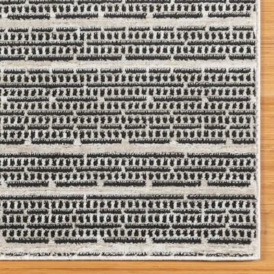 Missha Dario Beige Black Tufted Synthetic 6' x 9' Area Rug