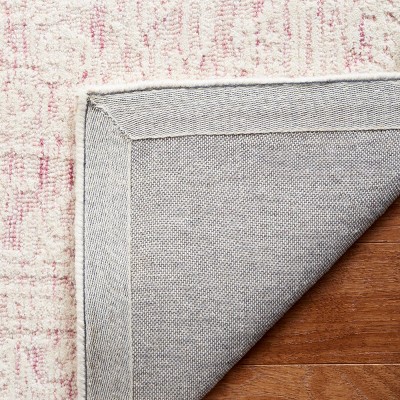 Ivory Wool Handmade Tufted 5' x 8' Area Rug