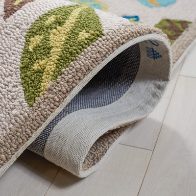 Ivory Floral Hand-Hooked Synthetic Area Rug 3'6" x 5'6"