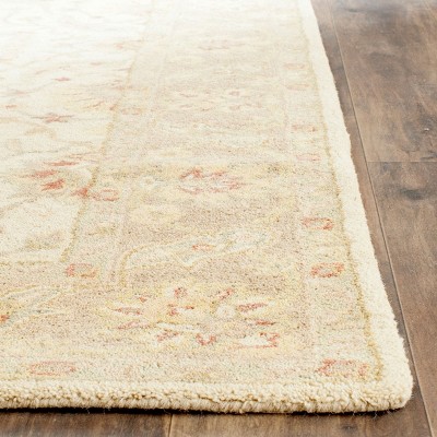 Ivory and Brown Handmade Wool Tufted Area Rug, 6' x 9'