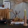 Storied Home Stoneware Taper Holder with Handles, Terracotta Sand Finish - 3 of 3