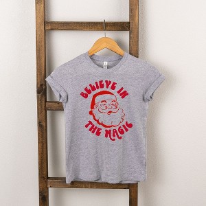 The Juniper Shop Believe In The Magic Santa Toddler Short Sleeve Tee - 1 of 2