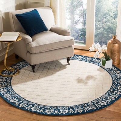 Ivory and Navy Hand-Hooked Round Oriental Rug