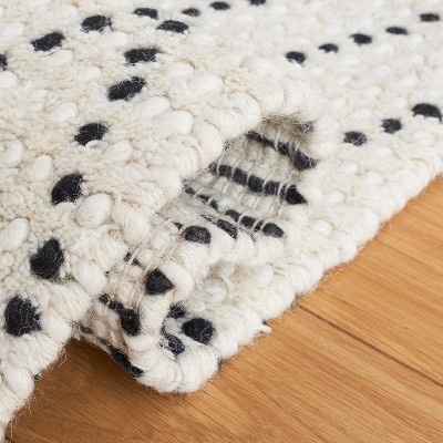 Black and Ivory Hand-Tufted Wool 8' x 10' Shag Rug