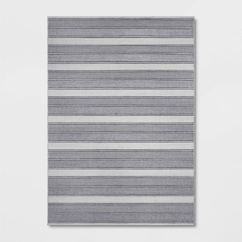 7&#39;x10&#39; Striped Rectangular Woven Outdoor Area Rug Charcoal Gray/Ivory - Threshold&#8482;, 1 of 6