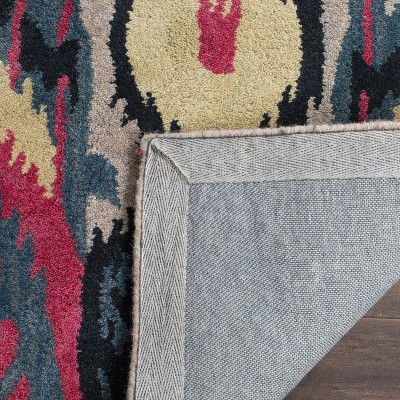 Handmade Blue and Beige Wool Ikat 4' x 6' Area Rug