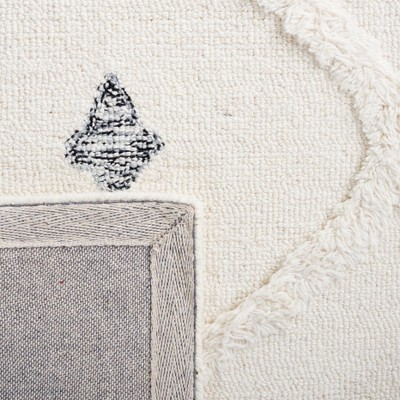 Ivory and Black 5' x 8' Hand Tufted Wool Shag Rug