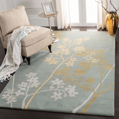 Handmade Multicolor 6' x 9' Tufted Wool Area Rug
