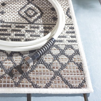 Havana Light Brown and Black Geometric Synthetic Indoor/Outdoor Area Rug