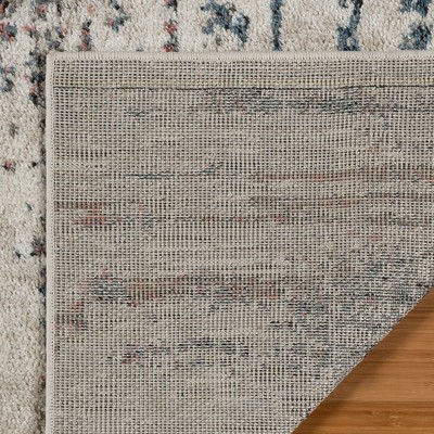 Ivory Tufted Synthetic 5' x 7' Rectangular Area Rug