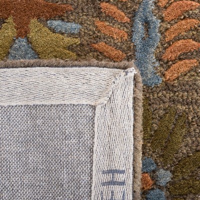 Handmade Blue Wool Tufted Floral Area Rug 5' x 8'