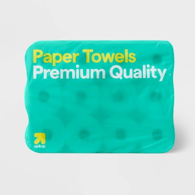 A package of paper towels with "Paper Towels Premium Quality" written in yellow and white on a teal colored background.