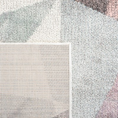 Ivory and Pink Geometric Floral 4' x 6' Synthetic Area Rug