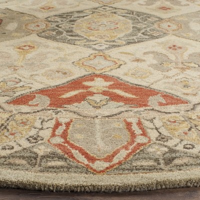 Antiquity Handmade Oval Red Wool Area Rug