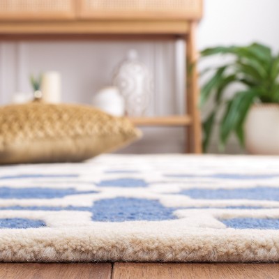 Navy Blue and Ivory Geometric Wool 4' x 6' Area Rug
