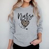 Simply Sage Market Women's Graphic Sweatshirt Leopard Nurse Heart - 2 of 3