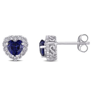 EVERLY JEWELRY | 10k White Gold 1 CT TGW Created Blue Sapphire and 1/10 CT TW Diamond Halo Heart Shaped Stud Earrings - 1 of 3
