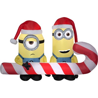 Gemmy Christmas Airblown Inflatable Minions Carrying Candy Cane Scene