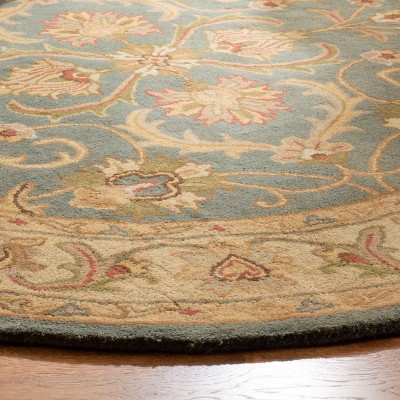 Handmade Blue and Beige Wool Oval Area Rug