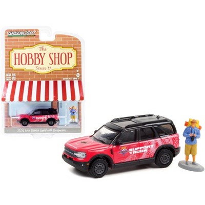 2021 Ford Bronco Sport Pink & Black "Off-Roadeo Adventure Support Truck" w/ Backpacker Figurine 1/64 Diecast Car by Greenlight