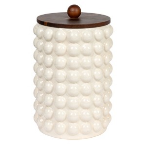 Storied Home Round Stoneware Canister with Raised Dots and Acacia Wood Lid, White and Natural - 1 of 4