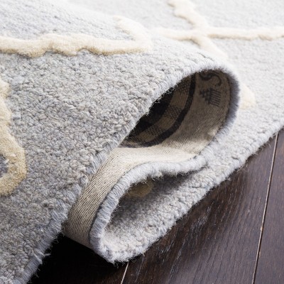 Light Blue and Ivory Hand-Tufted Wool 4' x 6' Area Rug