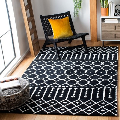 Black and Ivory 6' x 9' Tufted Wool Area Rug