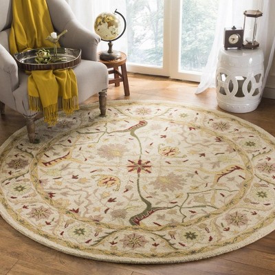 Ivory Round Handmade Wool Tufted Area Rug