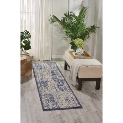 Ivory and Navy Blue Medallion 2'2" x 7'6" Synthetic Area Rug