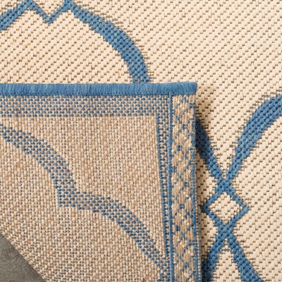 Cream and Blue Geometric Flat Woven Area Rug