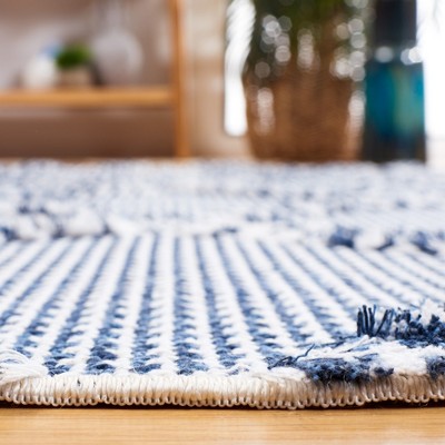 Navy & Ivory Nomadic Charm 8' x 10' Synthetic Area Rug