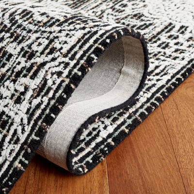 Handmade Black Wool 6' x 9' Tufted Area Rug