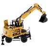 CAT Caterpillar M318 Wheeled Excavator Yellow with Operator "High Line" Series 1/50 Diecast Model by Diecast Masters - 3 of 4