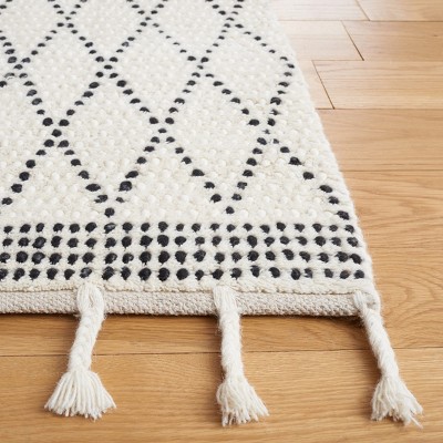 Black and Ivory Hand-Tufted Wool 8' x 10' Shag Rug