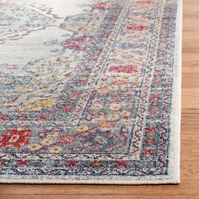 8' x 10' Cream and Fuchsia Synthetic Reversible Area Rug