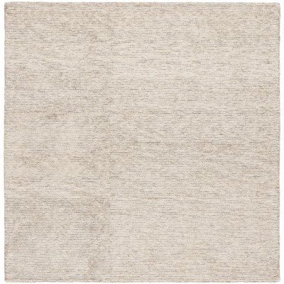 Ebony EBN950 Handmade Tufted Rug - Safavieh
