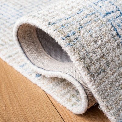 Ivory and Beige Abstract Handmade Wool Area Rug, 6' x 9'
