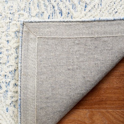 Handmade Blue Wool 5' x 8' Tufted Area Rug