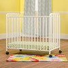 Child Craft Siesta Metal Compact Non-Folding Portable Crib with 2" Crib Mattress and Locking Wheels, Durable Metal Construction, Easy to Clean (White) - 4 of 4