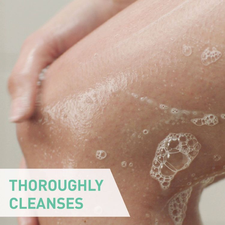Bubbles and lather on skin with the text "THOROUGHLY CLEANSES" in the corner.