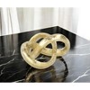 HomeRoots 6" Gold Cast Iron Modern Abstract Infinity Knot Tabletop Sculpture - 2 of 4