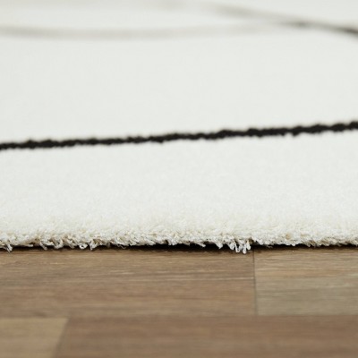 White and Black Abstract Polyester Rectangular Rug 5' x 7'
