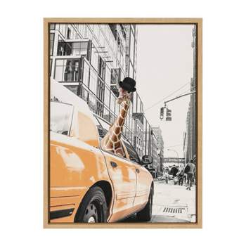 Kate & Laurel All Things Decor 18"x24" Sylvie Giraffe in New York Framed Canvas Wall Art by July Art Prints Natural Zoo Animal City