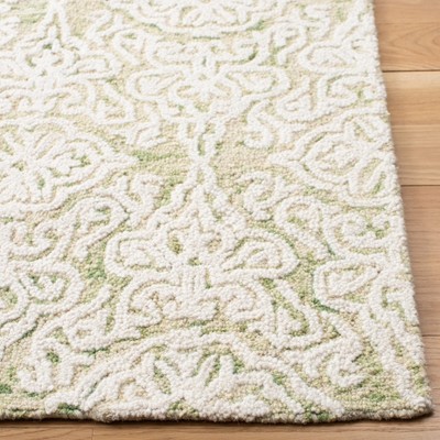 Ivory Floral Hand-Tufted Wool 4' x 6' Area Rug