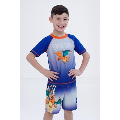 Pokemon Charizard Little Boys UPF 50+ Rash Guard and Swim Trunks Outfit Set Navy / Orange Charizard 7-8 — фото 2
